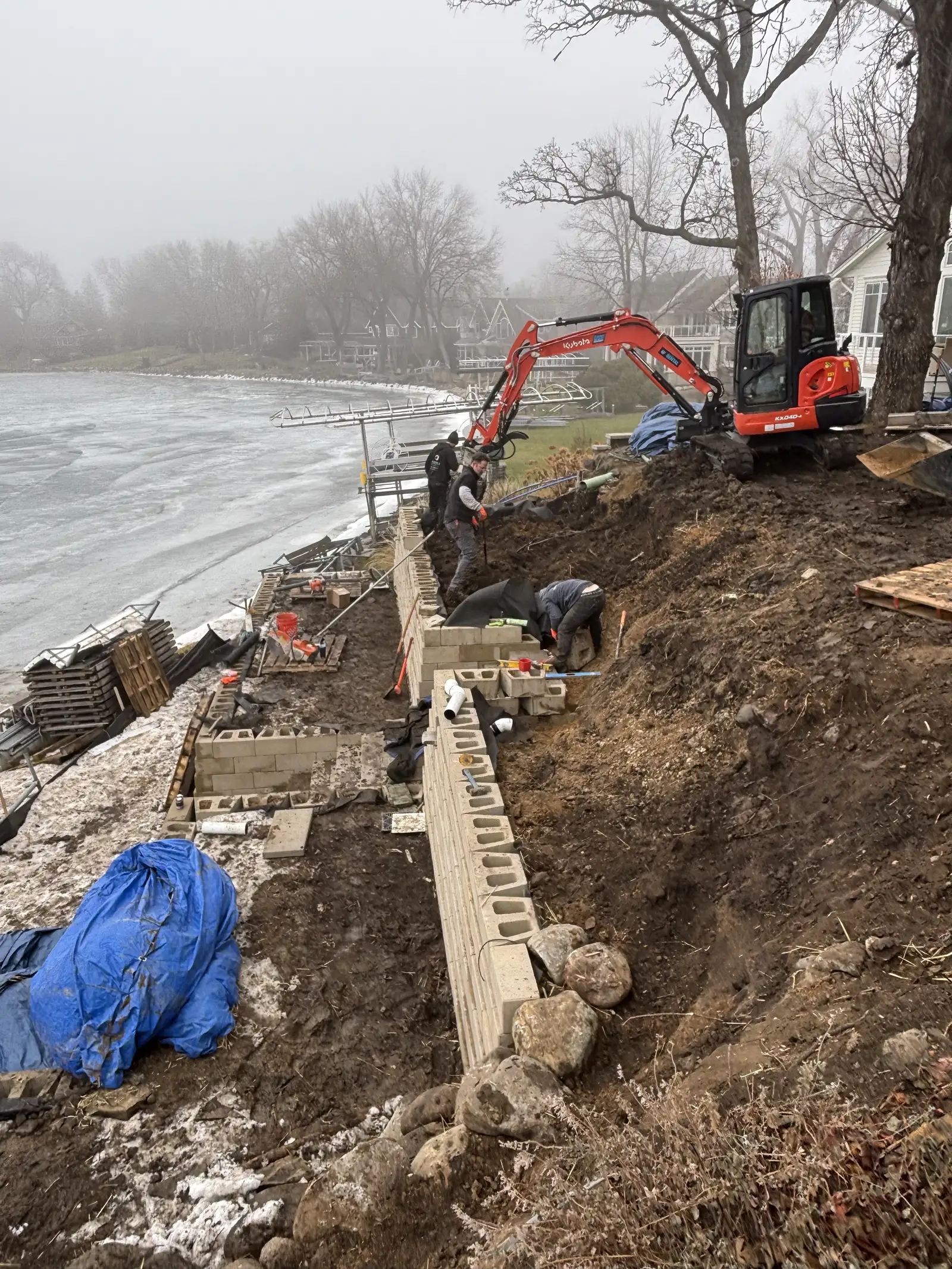 Excelsior lakeside renovation — putting green and privacy panels