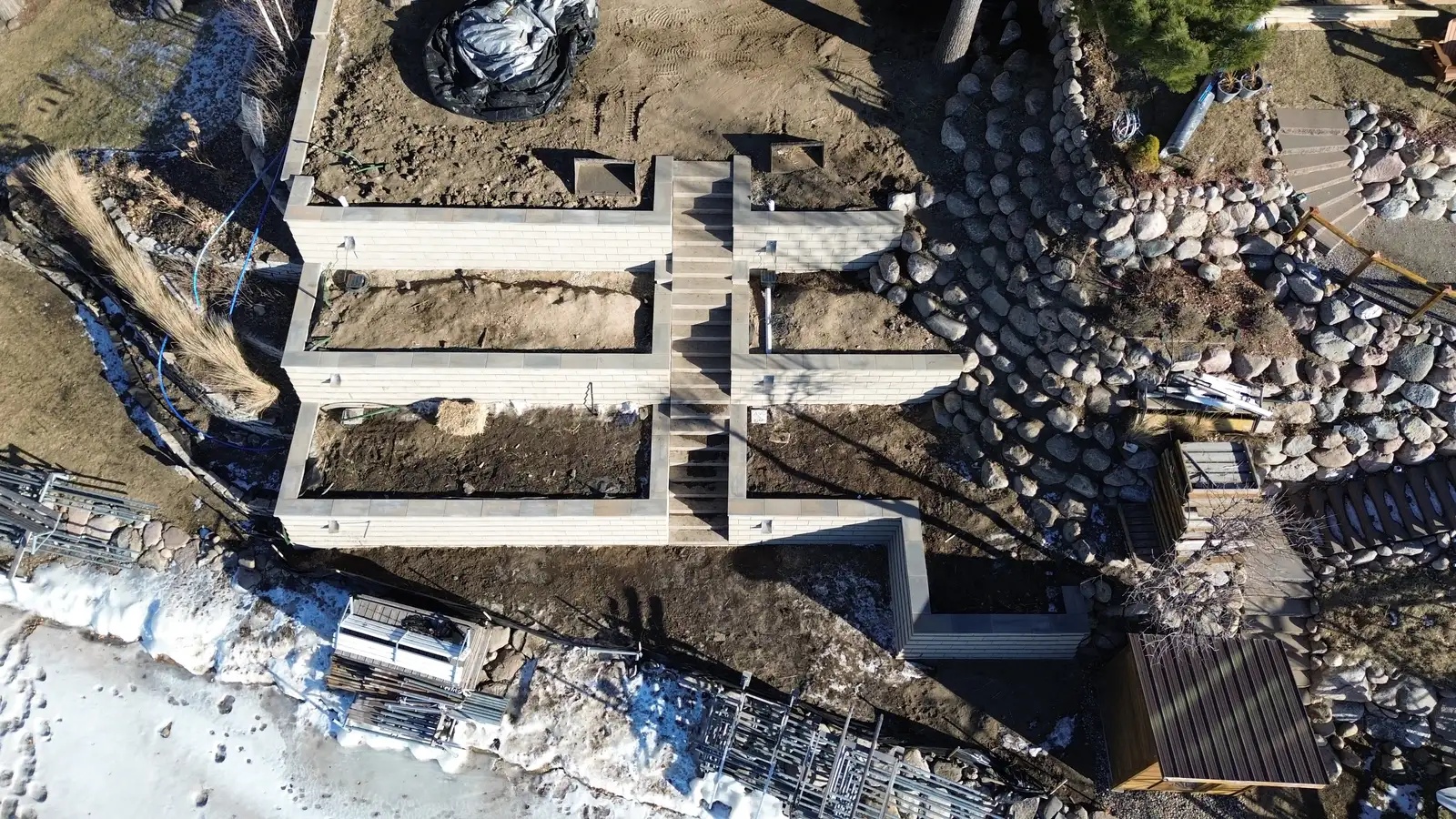 LED pathway and accent lighting illuminating retaining wall and staircase at night in Excelsior, MN