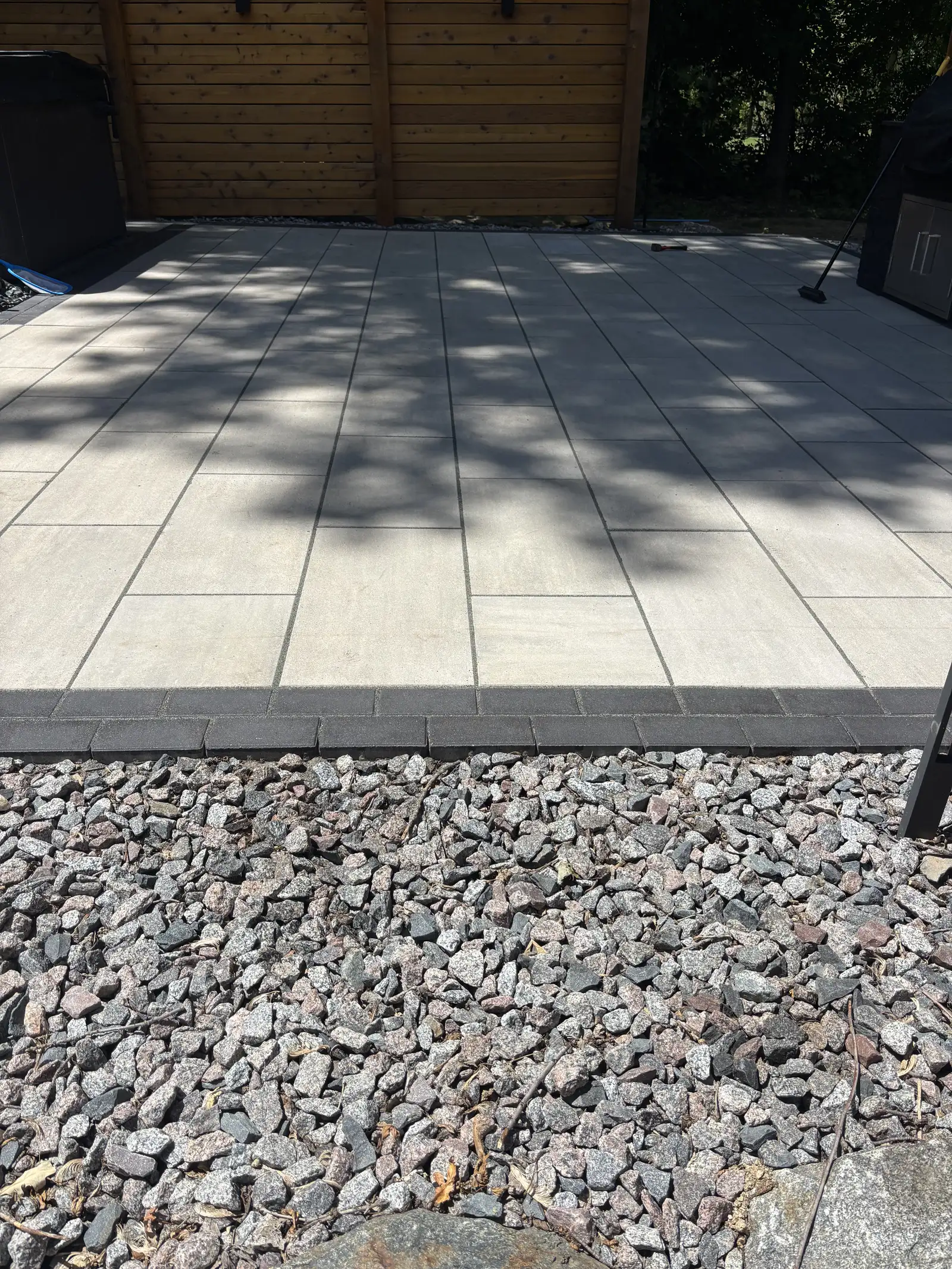 Paver patio and retaining wall in a Shakopee, MN backyard