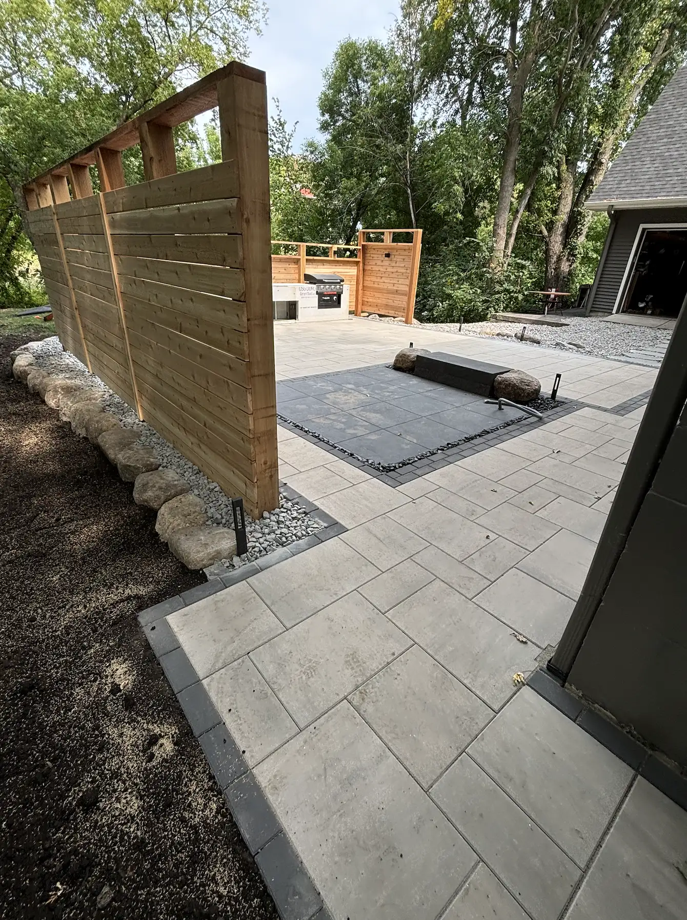 Waconia outdoor living — boulder retaining wall detail