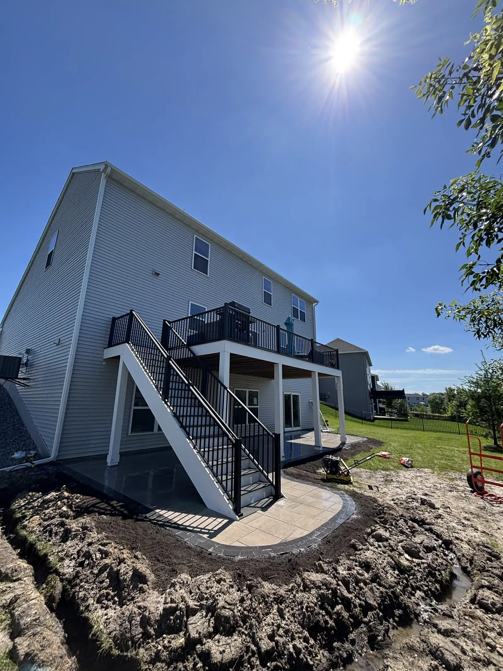 Wayzata paver patio — completed backyard view